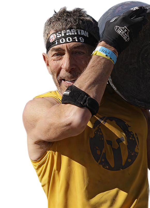 Dr. Mark Rosenbloom competing in a Spartan race